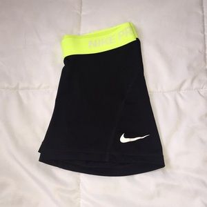 Black and green Nike spandex